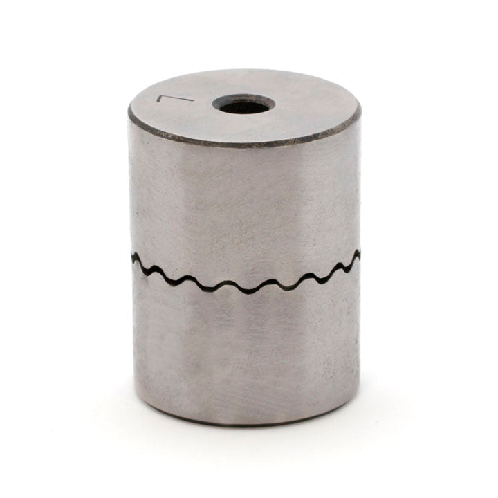 Cylindrical steel hoop-forming press die with a wavy line around the middle and a hole through the top face.