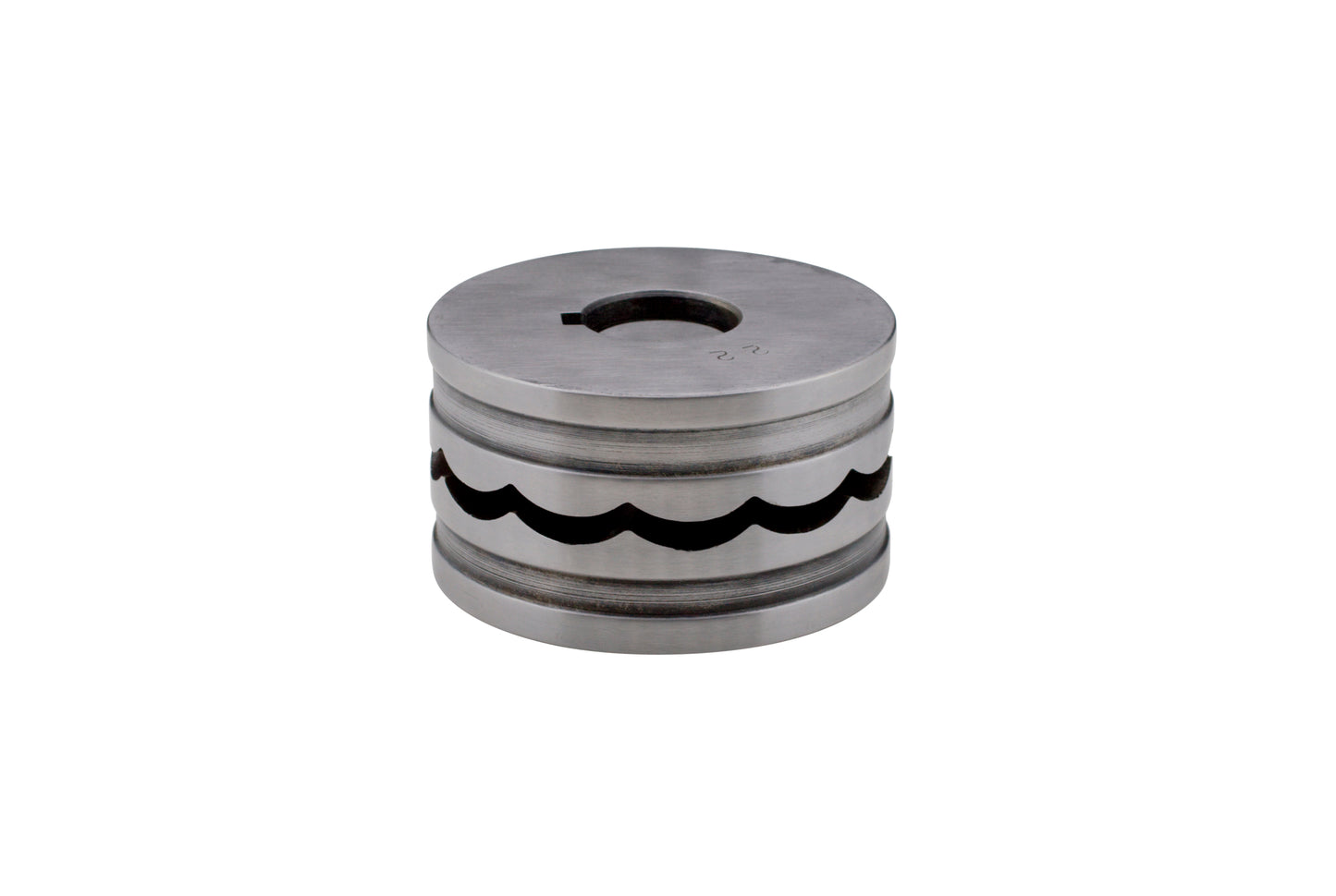 Cylindrical steel bangle-forming press die with a large wave pattern around it.