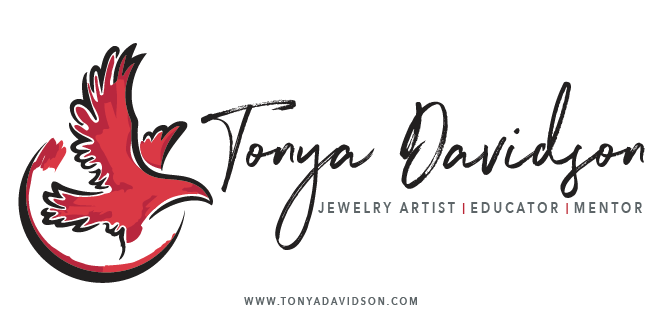 Tonya Davidson logo, red bird and lower red half circle on the left